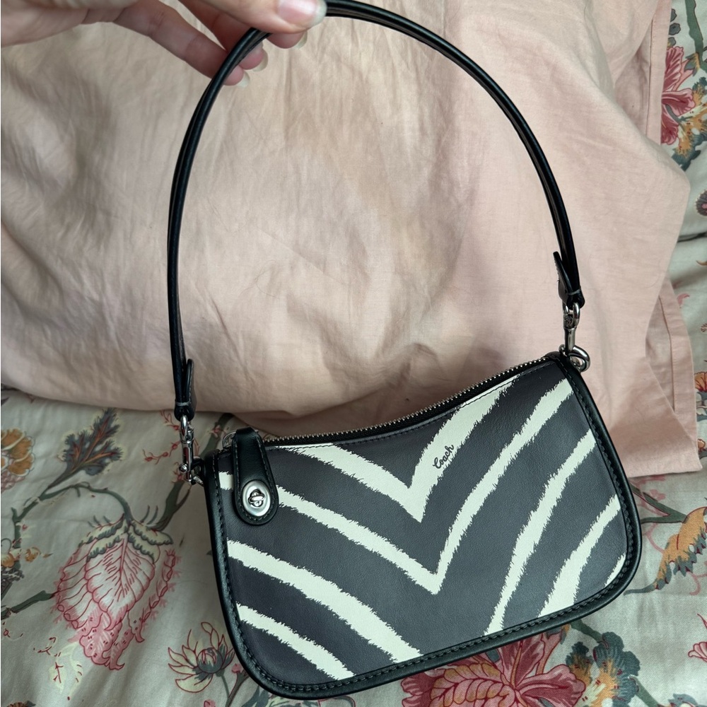 SOLD - Coach Zebra Swing Zip